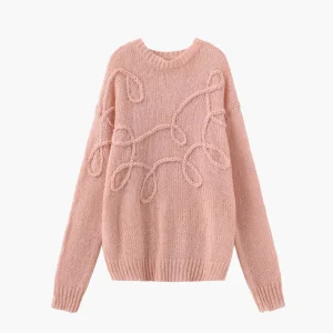 Pull femme à motif texturé moderne